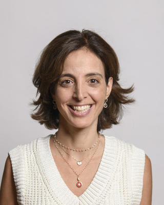 headshot of Sarine Der Kaloustian